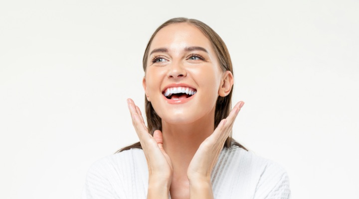 happy woman with glowing skin